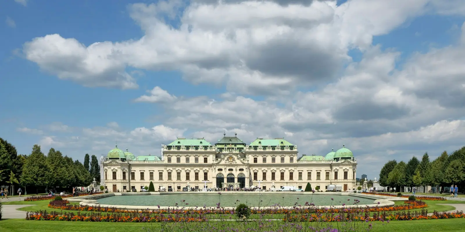 Explore the grandeur of Belvedere Palace surrounded by lush gardens in Vienna, Austria.