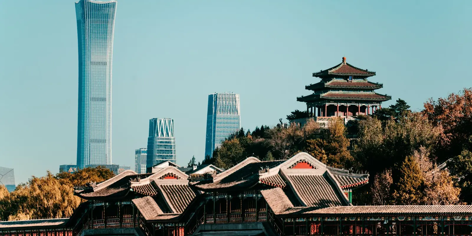 Captivating view of Beijing's skyline featuring traditional architecture and the modern China Zun skyscraper.