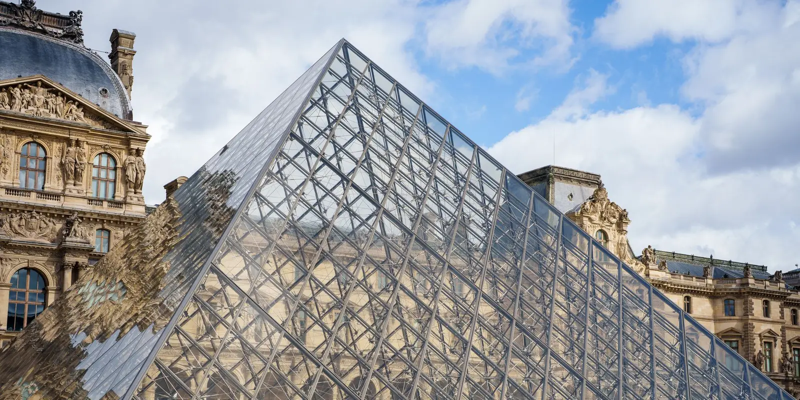 Iconic glass pyramid of the Louvre Museum in Paris, France.