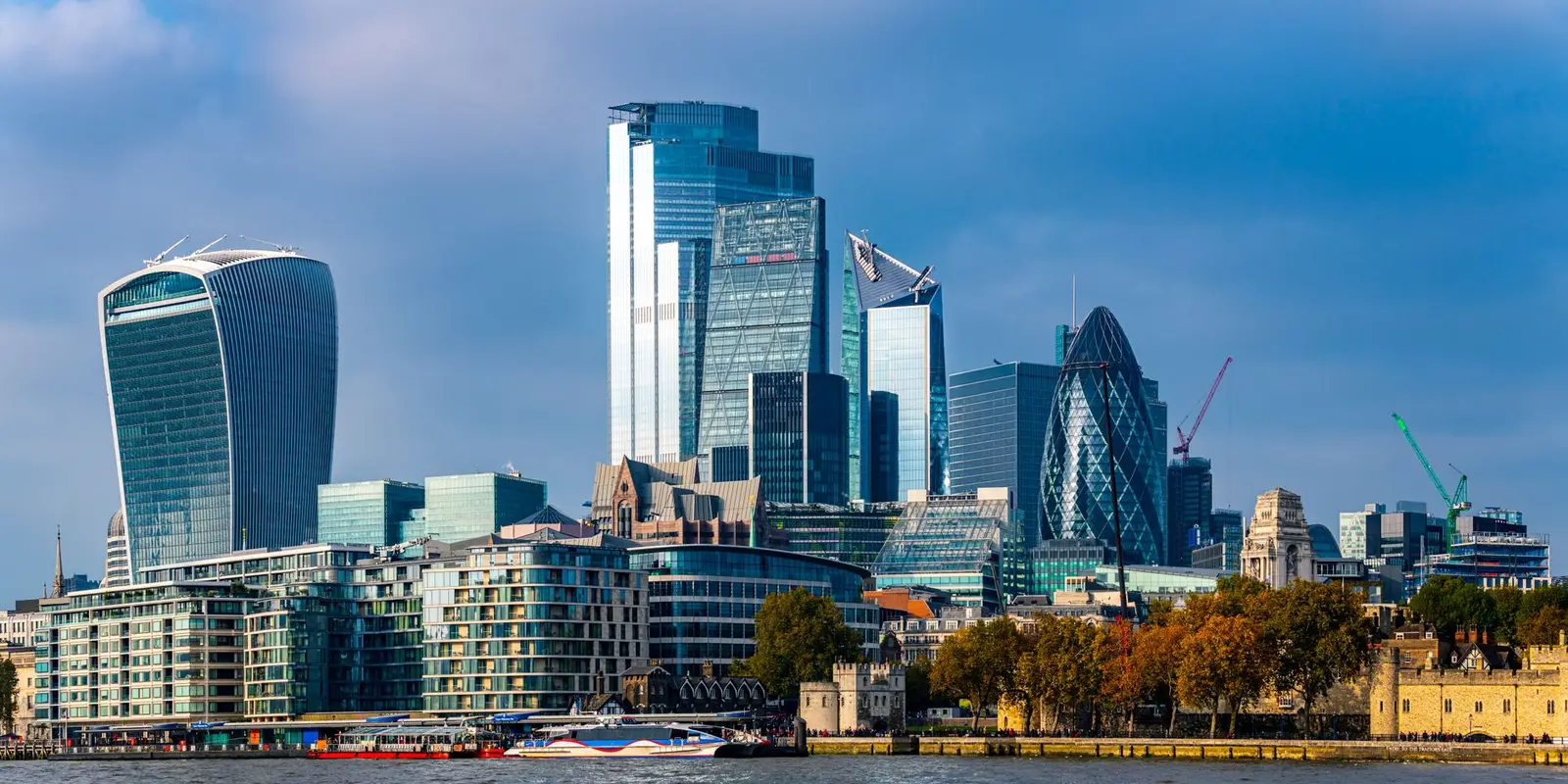 Stunning view of the London skyline featuring iconic skyscrapers along the River Thames.